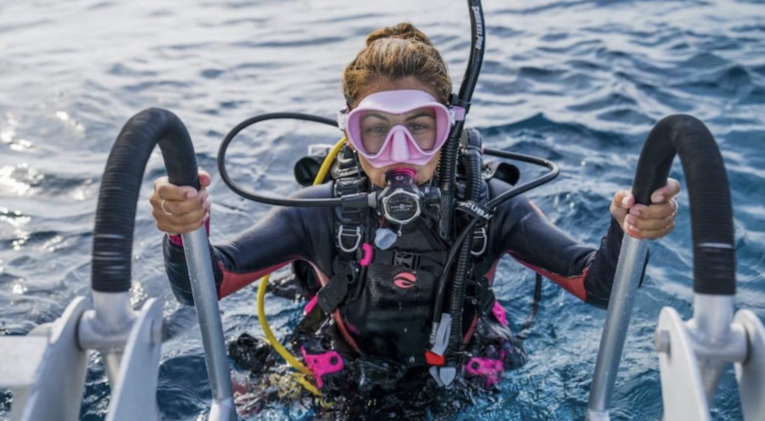 Beginner learning to scuba dive in Diani