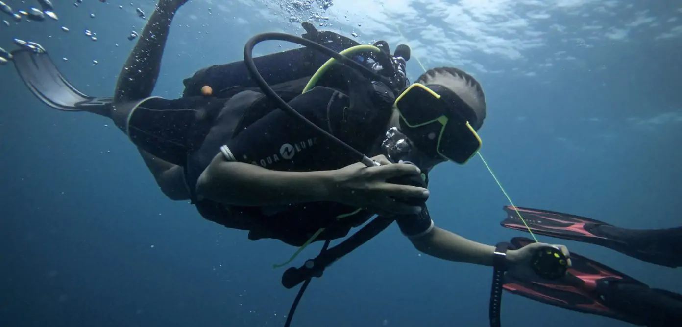 Beginner diver trying scuba in Diani