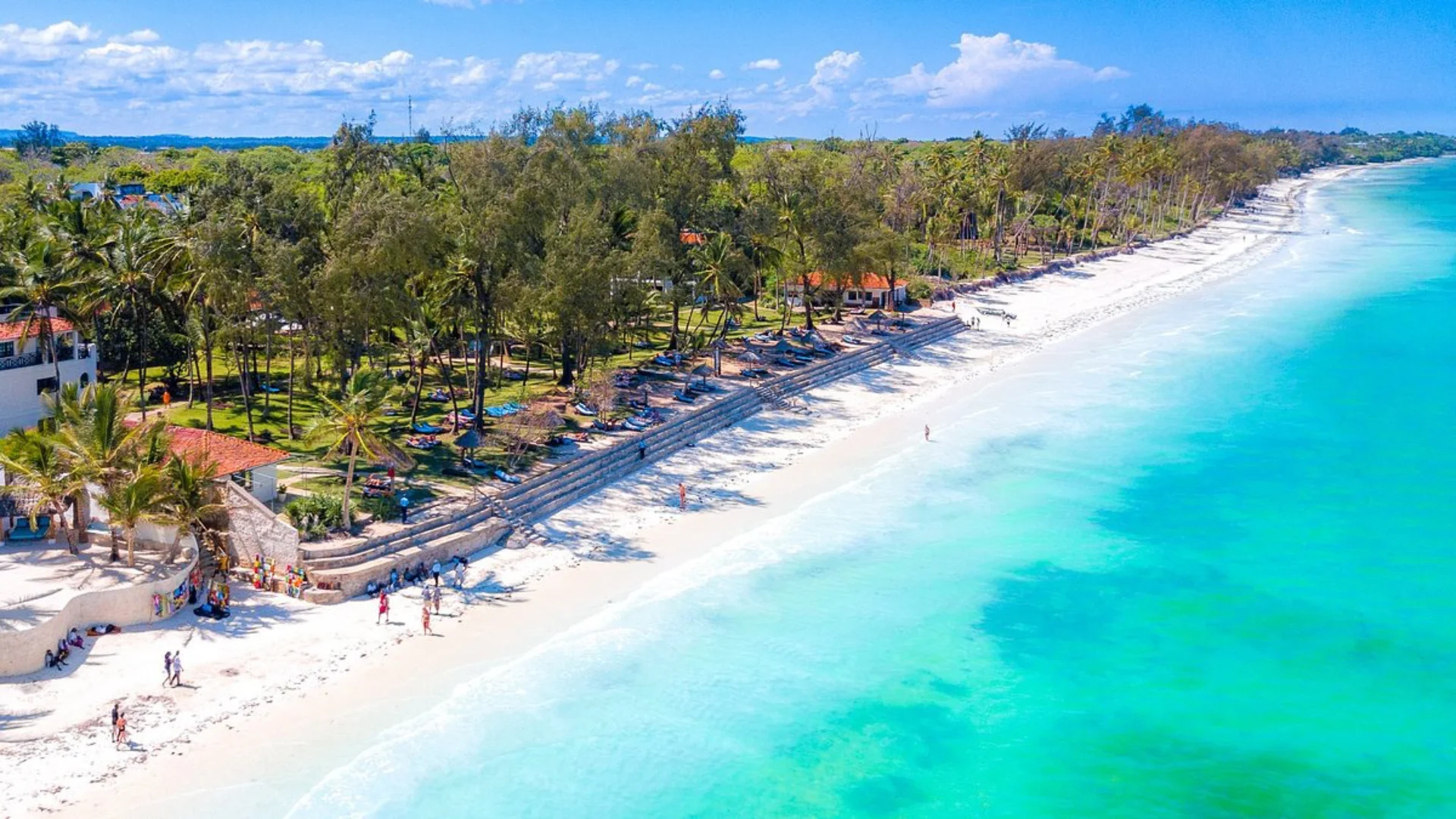 White sand and palm trees on Diani Beach, Kenya
