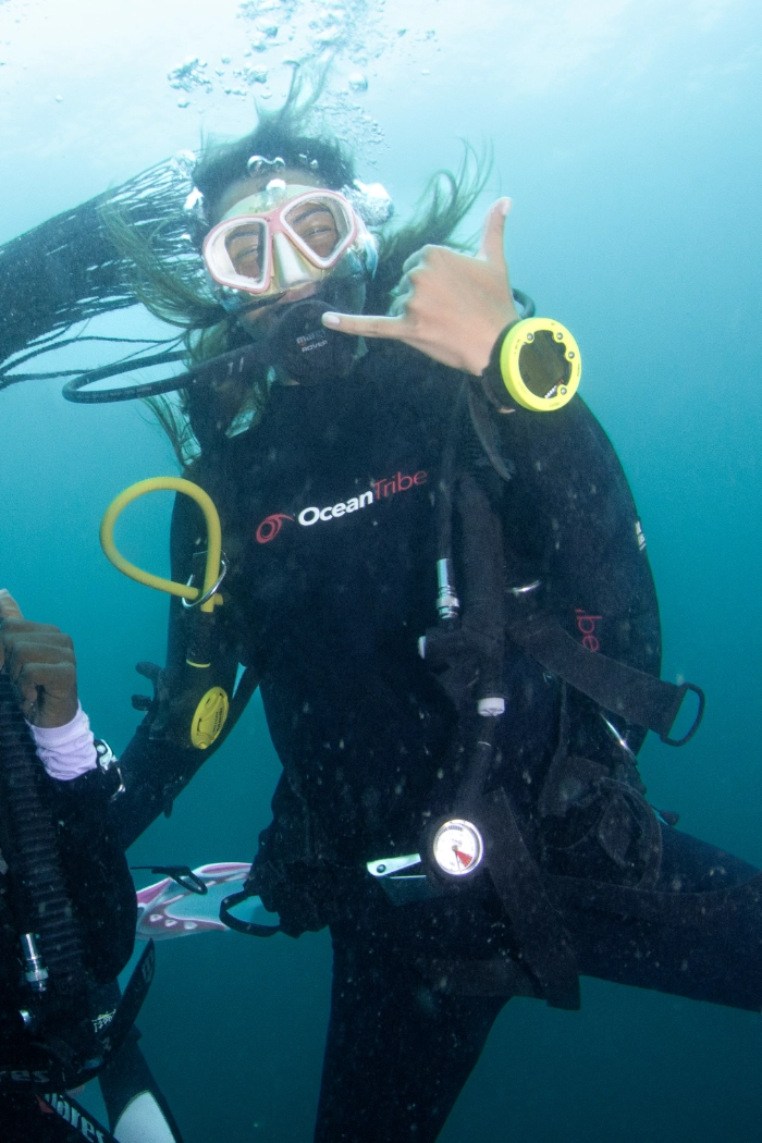 Certified scuba diver enjoying the underwater world in Diani Beach